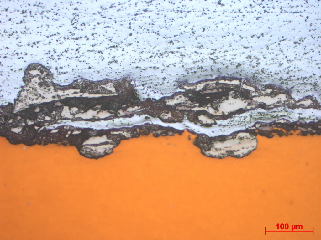 White (CRS) has penetrated all the way to metal surface (orange)